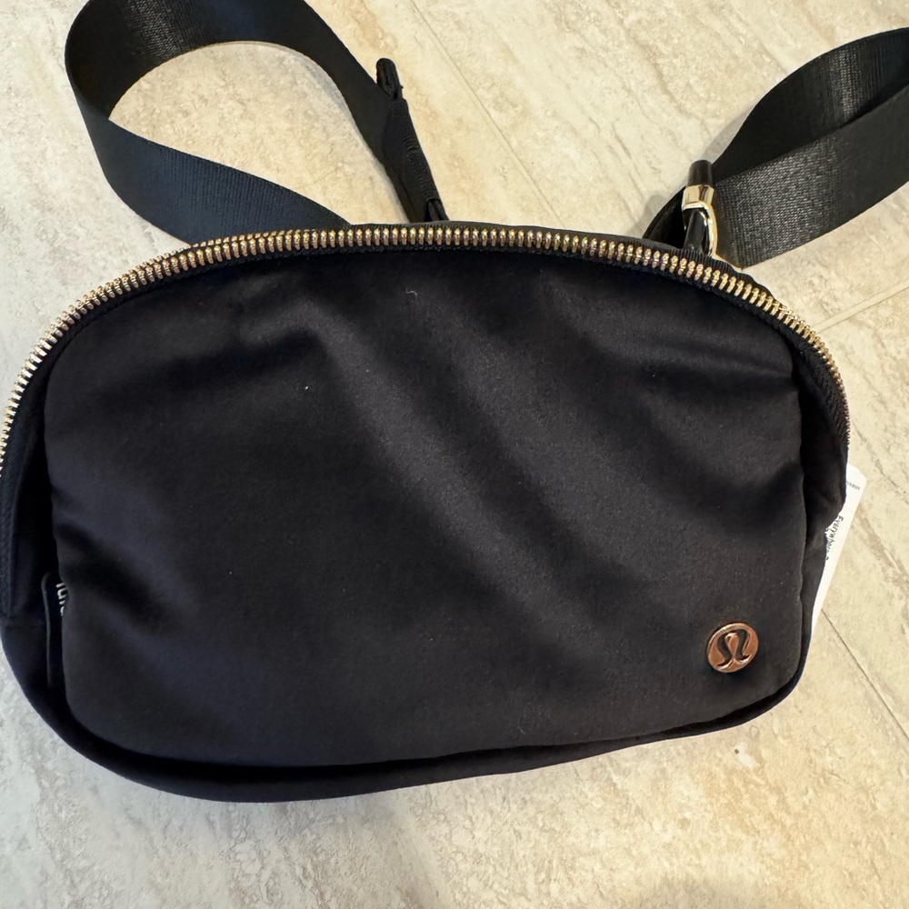 Lululemon Athletica Black Belt Bag with Gold Accents